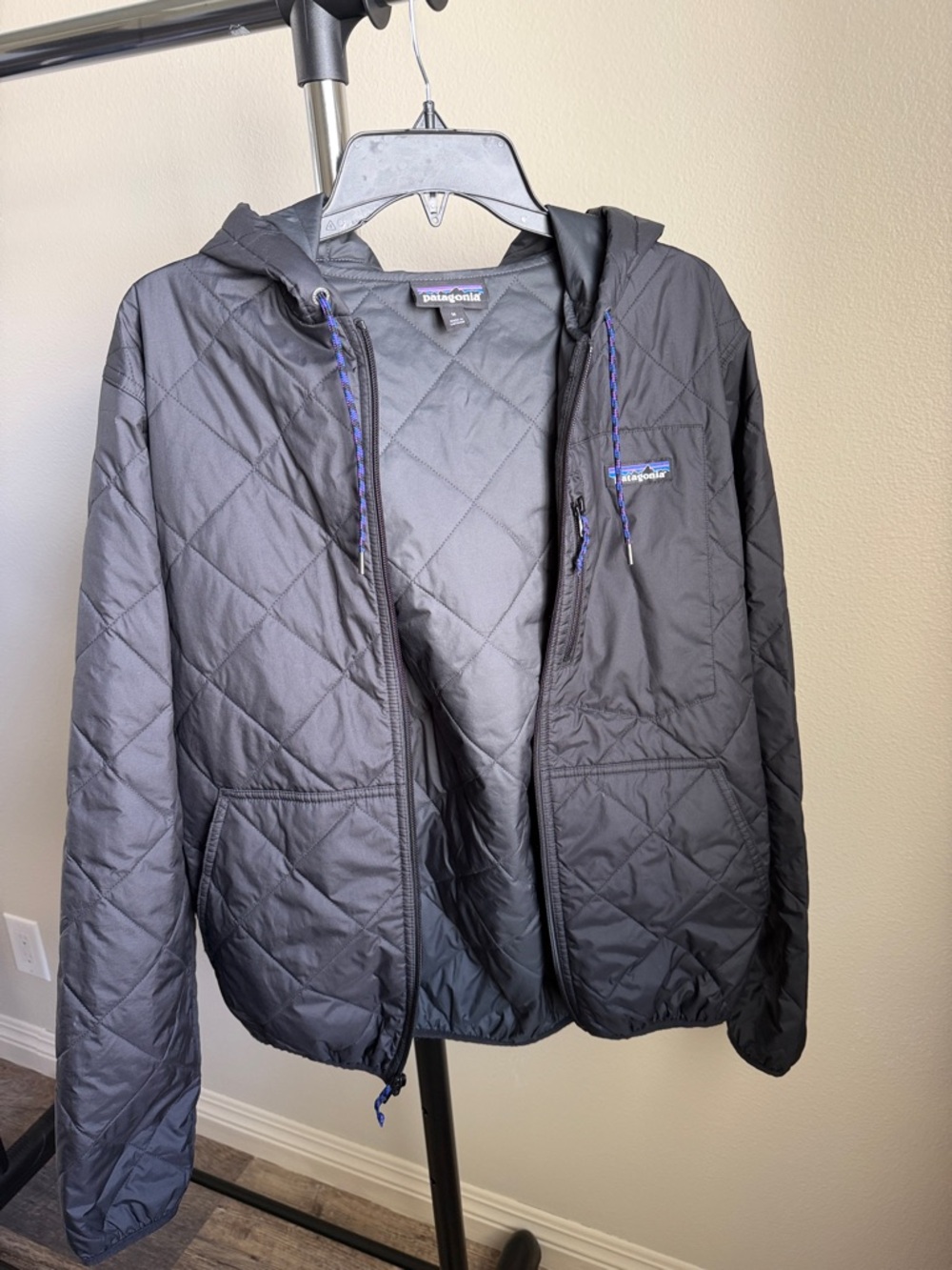 Patagonia Black Quilted Hooded Jacket with Blue Accents